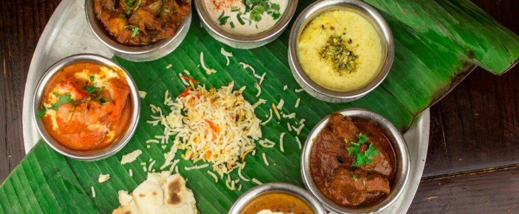 Itihaas thali and katori with rice and naan