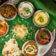 Itihaas thali and katori with rice and naan